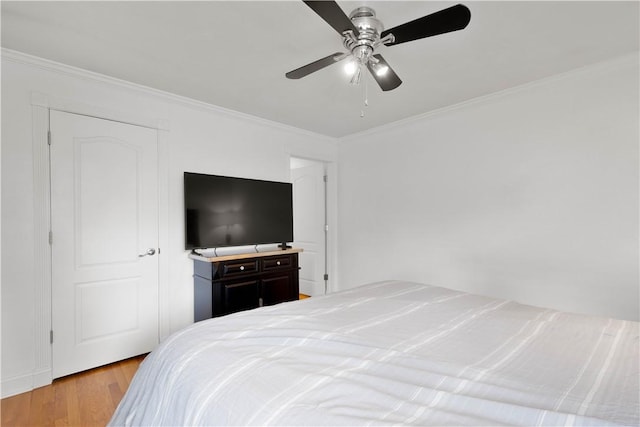 708 Washington St, Bentleyville, PA 15314 - bedroom featuring ornamental molding, wood finished floors, and a ceiling fan