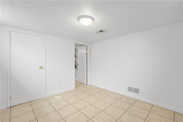 708 Washington St, Bentleyville, PA 15314 - unfurnished bedroom with light tile patterned floors and baseboards