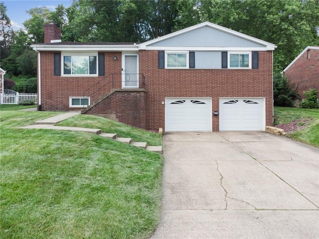 249 Laurie Dr, Penn Hills, PA 15235 - ranch-style house with an attached garage, brick siding, concrete driveway, and a chimney