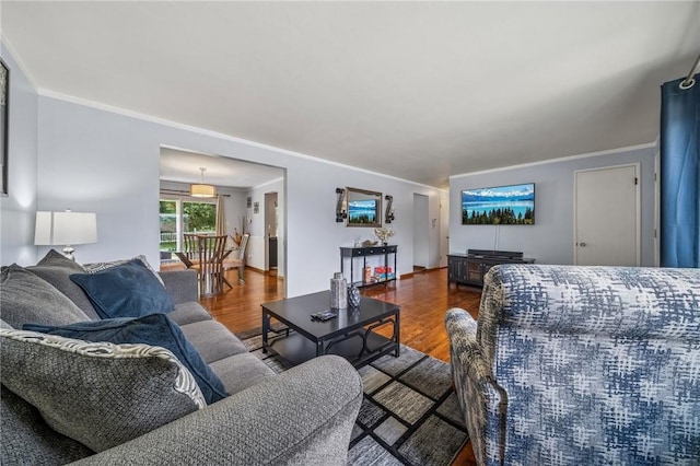 249 Laurie Dr, Penn Hills, PA 15235 - living room featuring wood finished floors and crown molding