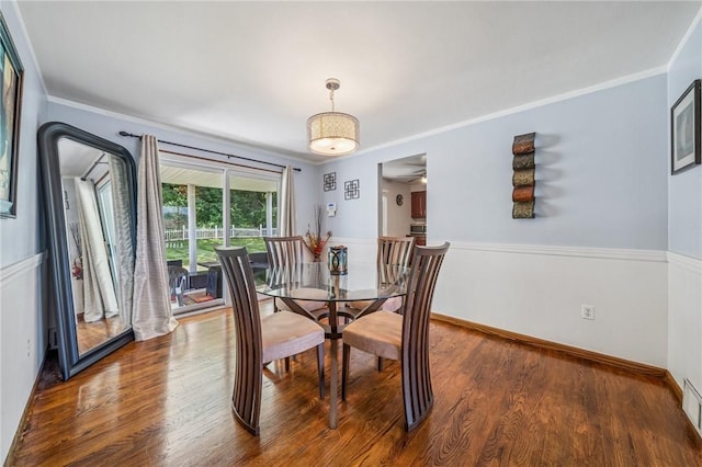 249 Laurie Dr, Penn Hills, PA 15235 - dining room featuring wood finished floors and crown molding