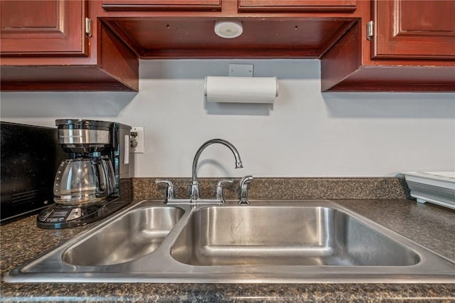 249 Laurie Dr, Penn Hills, PA 15235 - kitchen view of a sink and dark countertops