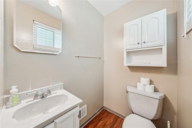 249 Laurie Dr, Penn Hills, PA 15235 - bathroom featuring vanity and wood finished floors