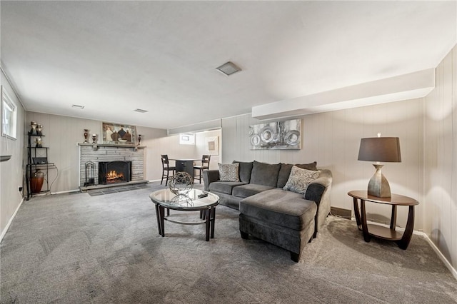 249 Laurie Dr, Penn Hills, PA 15235 - living area featuring carpet floors and a stone fireplace