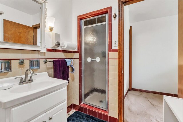 200 Champa St, Penn Hills, PA 15235 - bathroom featuring vanity, a stall shower, and tile walls