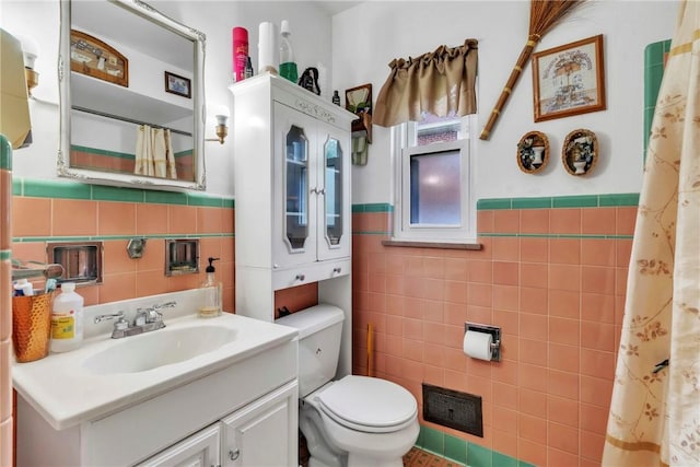 200 Champa St, Penn Hills, PA 15235 - bathroom with tile walls, a wainscoted wall, vanity, and a shower with curtain