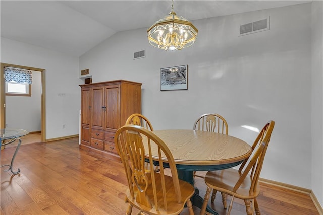 488 Buffalo St, Beaver, PA 15009 - dining space featuring lofted ceiling, a chandelier, and light wood-style floors