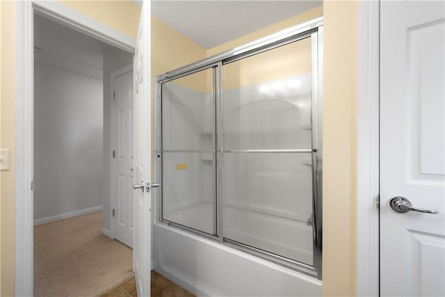 138 Crossridge Rd, Fallowfield, PA 15022 - bathroom featuring shower / bath combination with glass door and baseboards