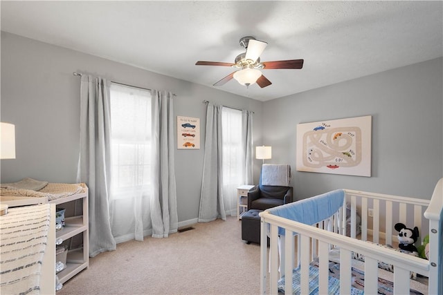 138 Crossridge Rd, Fallowfield, PA 15022 - carpeted bedroom featuring a nursery area and a ceiling fan
