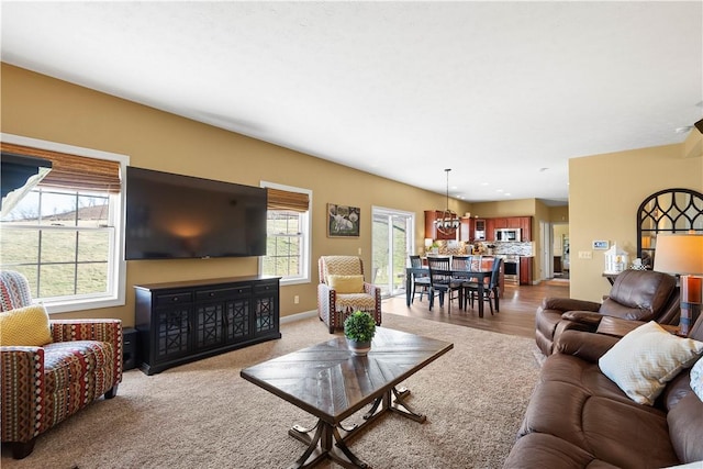 138 Crossridge Rd, Fallowfield, PA 15022 - carpeted living area featuring a chandelier
