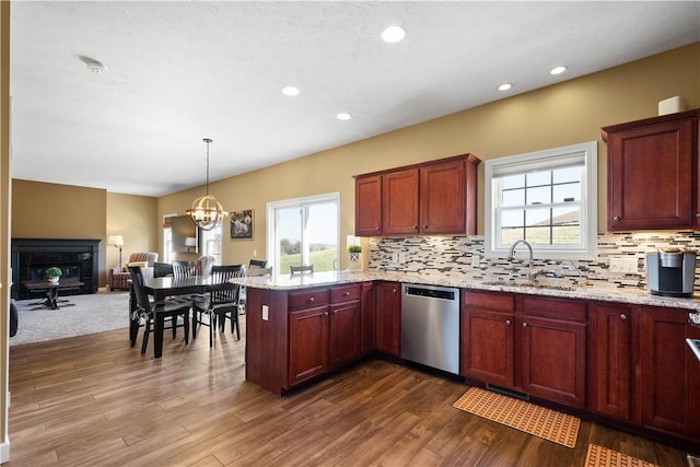 138 Crossridge Rd, Fallowfield, PA 15022 - kitchen with dishwasher, a peninsula, tasteful backsplash, dark wood-type flooring, and recessed lighting
