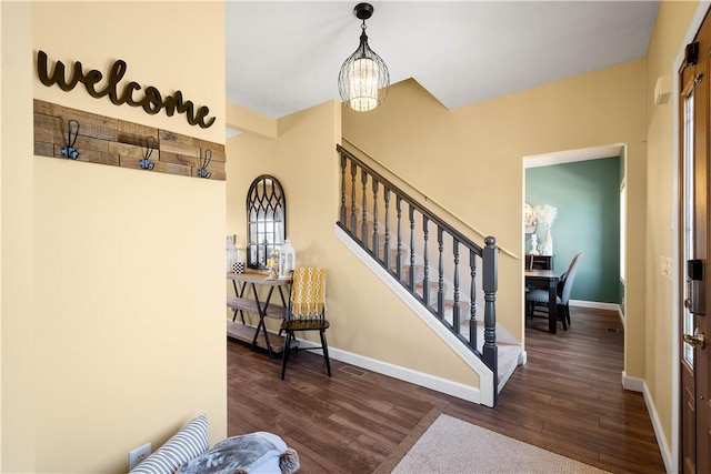 138 Crossridge Rd, Fallowfield, PA 15022 - stairway featuring wood finished floors and a chandelier