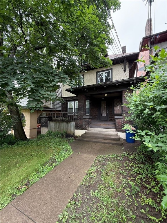5837 Nicholson St, Squirrel Hill, PA 15217 - back of house featuring brick siding and stucco siding