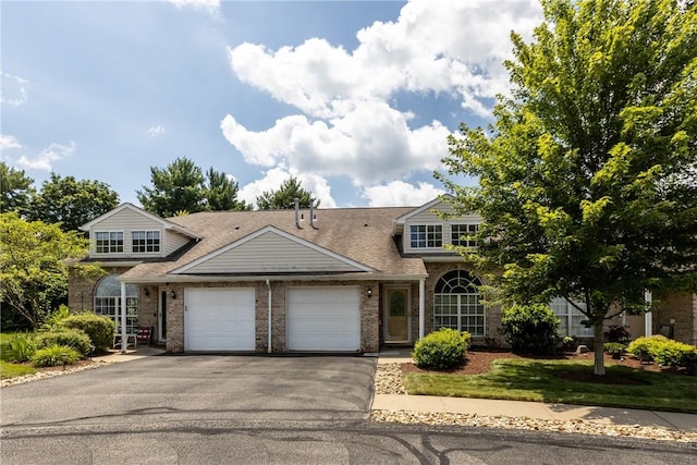 302 Malcolm Ct, Monroeville, PA 15146 - traditional-style house with a garage, brick siding, driveway, and roof with shingles