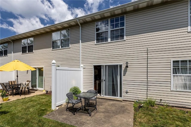 302 Malcolm Ct, Monroeville, PA 15146 - back of property with a patio and a yard