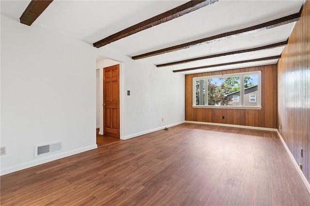 718 Twin Oak Dr, Penn Hills, PA 15235 - unfurnished room with wood finished floors, beam ceiling, and wood walls