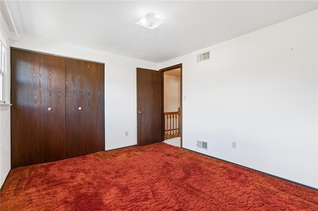718 Twin Oak Dr, Penn Hills, PA 15235 - unfurnished bedroom with carpet floors and a closet