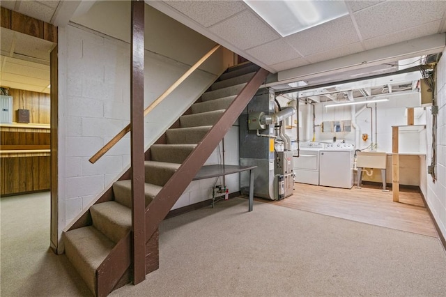 718 Twin Oak Dr, Penn Hills, PA 15235 - finished below grade area with stairway, separate washer and dryer, heating unit, carpet flooring, and a drop ceiling