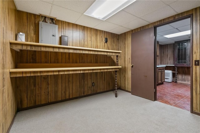 718 Twin Oak Dr, Penn Hills, PA 15235 - bar area featuring wooden walls, carpet floors, electric panel, and a paneled ceiling