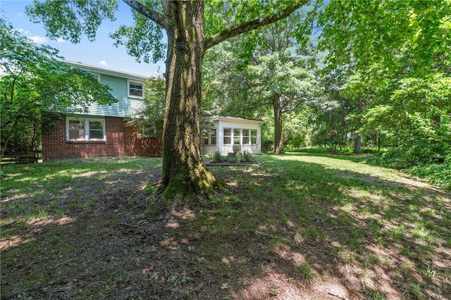 718 Twin Oak Dr, Penn Hills, PA 15235 - view of grassy yard with a sunroom