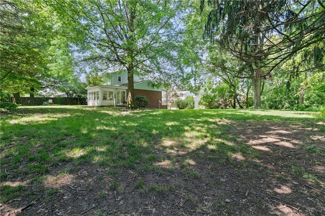 718 Twin Oak Dr, Penn Hills, PA 15235 - view of yard with a sunroom