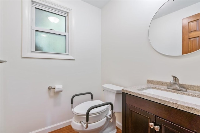 718 Twin Oak Dr, Penn Hills, PA 15235 - bathroom featuring vanity and wood finished floors