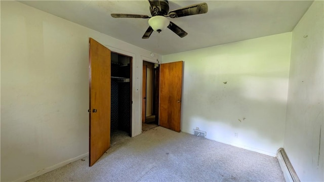 89 Rankin Rd, Wharton Twp, PA 15437 - unfurnished bedroom featuring a baseboard heating unit, carpet, and a ceiling fan