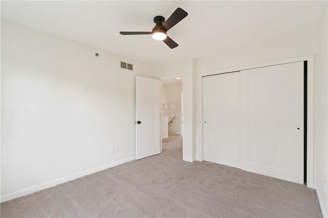 1278 Meadowbrook Dr, North Strabane, PA 15317 - unfurnished bedroom featuring light carpet, a closet, and a ceiling fan