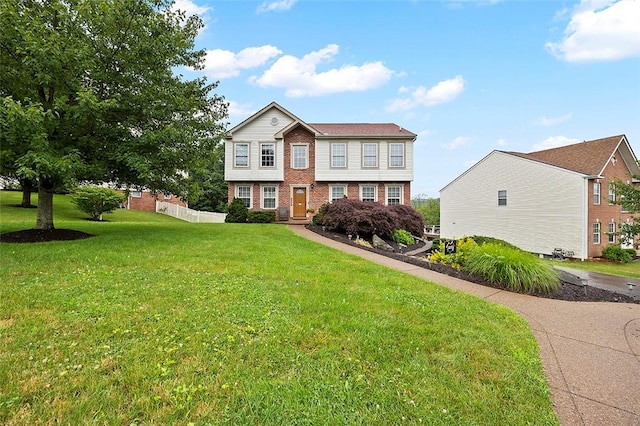 1071 Shawnee Ridge Dr, Cheswick, PA 15024 - view of front facade with brick siding and a front yard