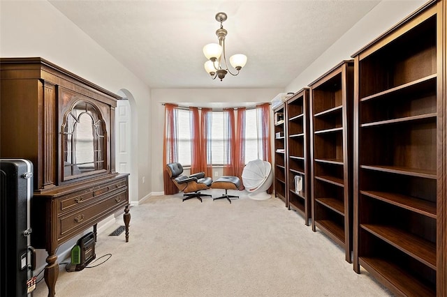 1071 Shawnee Ridge Dr, Cheswick, PA 15024 - living area with light colored carpet and a chandelier
