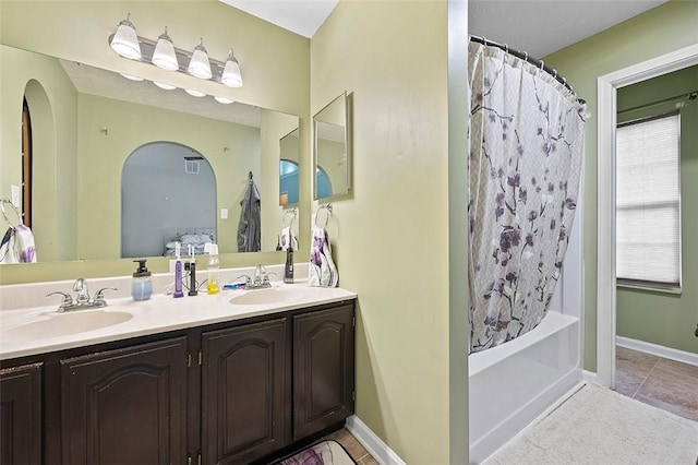 1071 Shawnee Ridge Dr, Cheswick, PA 15024 - full bath featuring double vanity, tile patterned floors, and shower / bath combination with curtain