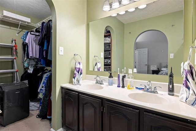1071 Shawnee Ridge Dr, Cheswick, PA 15024 - full bathroom featuring double vanity, ensuite bathroom, and a spacious closet
