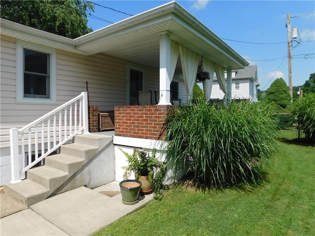 118 Harrison St, Elizabeth Twp/Boro, PA 15037 - doorway to property featuring a lawn