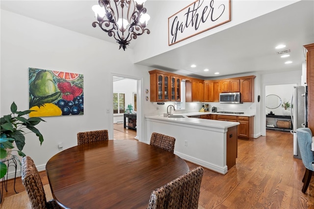 1413 Oak St, Oakmont, PA 15139 - dining room featuring a chandelier, light wood-style flooring, and recessed lighting