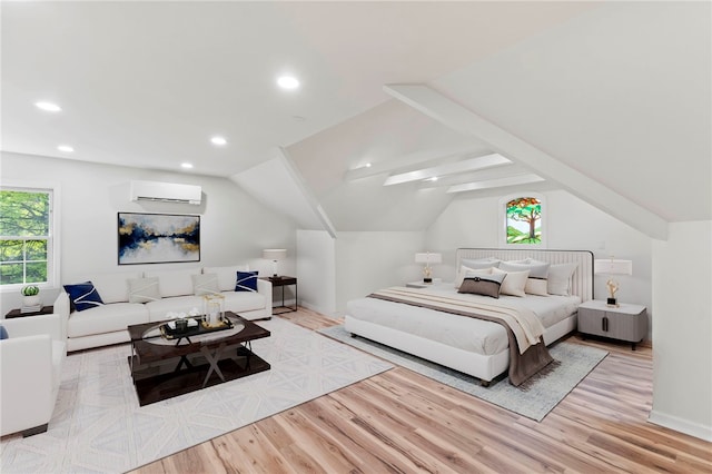 1413 Oak St, Oakmont, PA 15139 - bedroom with a wall mounted air conditioner, light wood-style flooring, recessed lighting, and vaulted ceiling