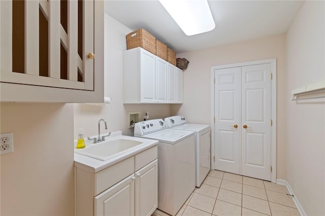 1413 Oak St, Oakmont, PA 15139 - laundry area with cabinet space, washing machine and clothes dryer, and light tile patterned floors