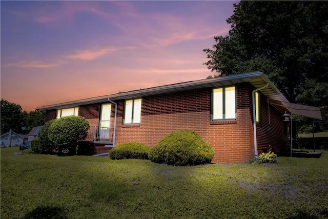 3015 Graham Ave, Windber, PA 15963 - view of side of property featuring a lawn and brick siding