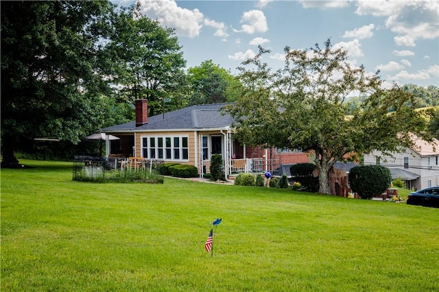3015 Graham Ave, Windber, PA 15963 - rear view of house with a chimney and a yard