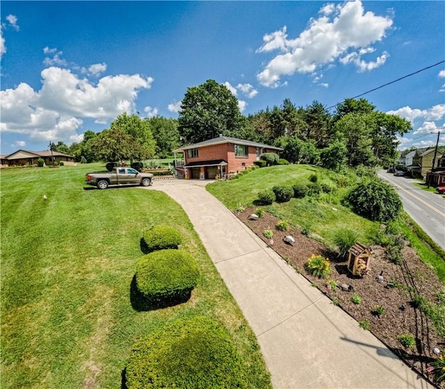 3015 Graham Ave, Windber, PA 15963 - surrounding community with driveway, a yard, and an attached garage