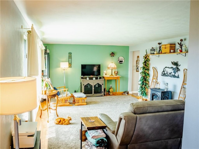 3015 Graham Ave, Windber, PA 15963 - living area with a wood stove and wood finished floors