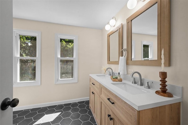 1014 Olga St, Ambridge, PA 15003 - bathroom featuring double vanity and tile patterned floors