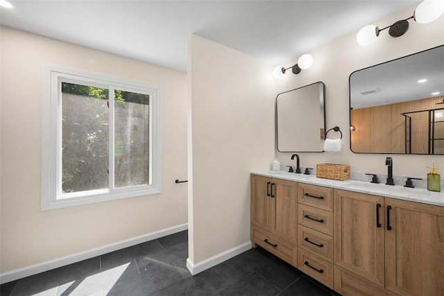 1014 Olga St, Ambridge, PA 15003 - bathroom featuring double vanity, tile patterned floors, and recessed lighting