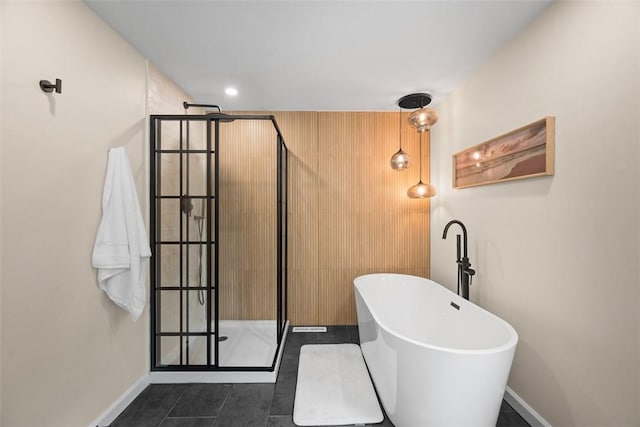 1014 Olga St, Ambridge, PA 15003 - bathroom with a shower stall, a soaking tub, and tile patterned flooring