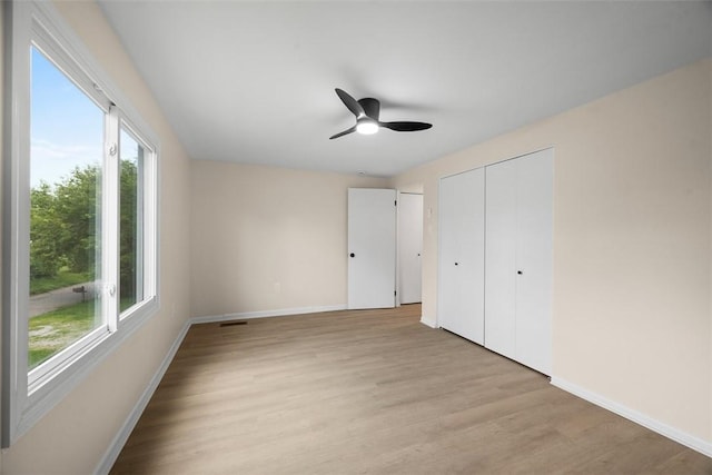 1014 Olga St, Ambridge, PA 15003 - unfurnished bedroom with light wood-style flooring and ceiling fan