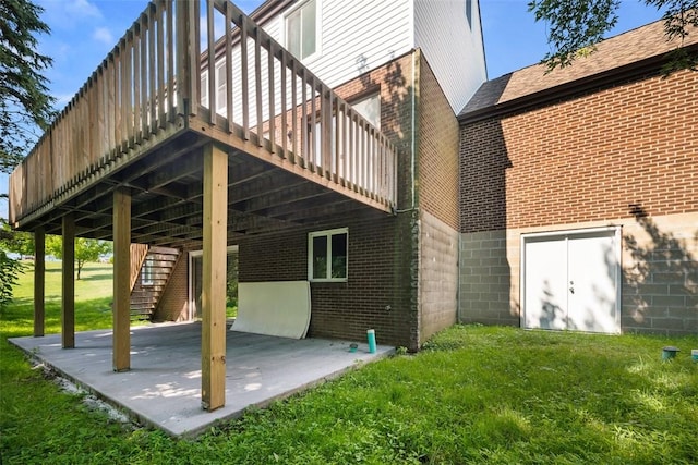 1014 Olga St, Ambridge, PA 15003 - rear view of property with a patio area, a yard, brick siding, and stairs