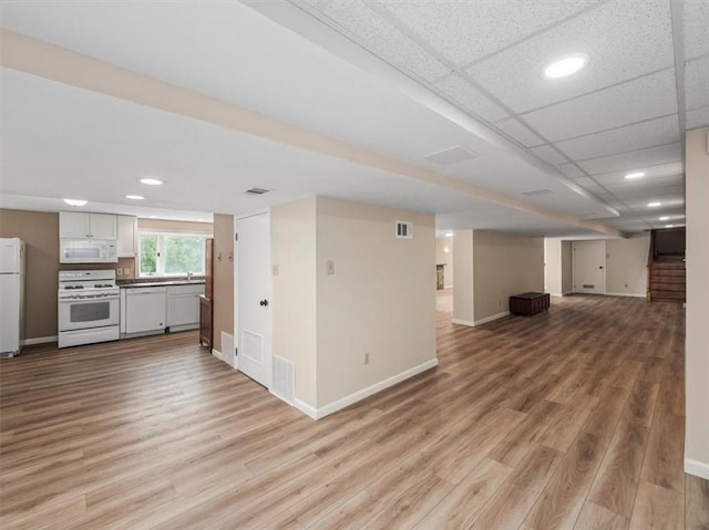 330 Center Grange Rd, Center Twp, PA 15061 - unfurnished living room with light wood finished floors, recessed lighting, and stairway