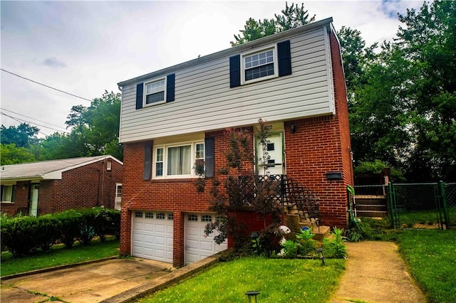 622 National Dr, Penn Hills, PA 15235 - colonial-style house with a garage, concrete driveway, and brick siding