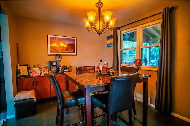 622 National Dr, Penn Hills, PA 15235 - dining area featuring a chandelier and dark wood-type flooring