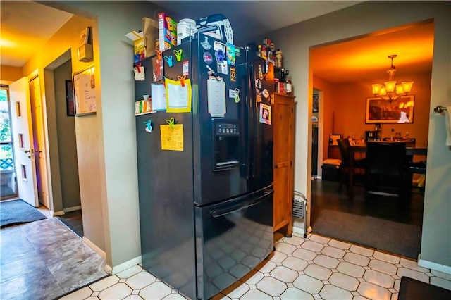 622 National Dr, Penn Hills, PA 15235 - kitchen featuring black fridge and a chandelier