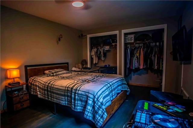 622 National Dr, Penn Hills, PA 15235 - bedroom featuring multiple closets and wood finished floors